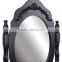 Black French style dressing table with oval mirror