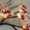 lighted red berry christmas wreath
