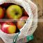 Reusable compostable cotton muslin veggie or fruit storage bag for produce