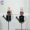 Iron garden stakes of metal beetle standing on kettle sticks for garden decoration