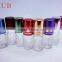 Hot sale mini empty 2ml 3ml plastic roll on ball deodorant glass bottle with colored aluminum cap