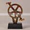 Wheelwork trophy cup in resin material