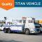 Sinotruck howo heavy duty flatbed rotator tow truck wrecker wheel lift for sale with arm crane
