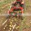 walking tractor driven carrot harvest machine