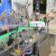 Automatic liquid filling machine price, fruit juice filling packaging machine