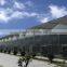 Good quality multi span polycarbonate flower greenhouse with shading system and growing lighting system