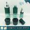 Green coloured cosmetic glass bottle and cosmetic glass jar