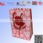 Wholesale high quality logo paper packaging gift bag with handles