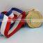 Gold simply metal medaille with ribbon