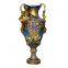 A Colorful Bronze Vase With Cherub Seated