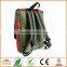 Red cotton twill and green nylon laminated water resistant fabric. Padded. Many pockets. Unique