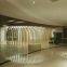 Original Ecological Wood Grain Curved Aluminum Square Pass Exhibition Center Supplier