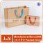 ISO certificated christmas gift cotton handle paper shopping kraft paper handle paper straw beach bag