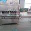 Automatic linear type oil wine bottle filling machine for olive cooking sunflower oil in bottle barrel or jar can