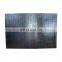 Bi-metal wear resistant plates for vibrating pans