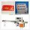 Refreshing towel flow wrapping machine