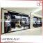 Modern hot sale retail wooden floor cosmetics display stand pink makeup display table