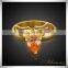 China Imported Jewelry Smooth Metal Angle Wing Red Zircon Gold Engagement Ring