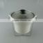 Stocked ceramic tureen with glass lid and iron stand