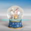 cute dog animal glass snow globe with polyresin base gift snow globe diameter 45mm