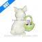 bunny with Easter basket figurine