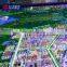 Scale model city handmade digital marketing screens for real estate