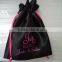 large black drawstring satin garment bag with logo