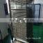 Stainless steel industrial drying rack into hot oven