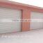 China Galvanized Steel Windproof Automatic Industrial Roller Shutter Door