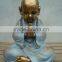 Sitting resin monk statue from sale