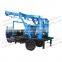 Portable hydraulic trailer mounted portable water well drilling rig