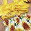 Explosion style yellow sling top sunflower skirt suit
