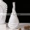 Creative spiral embossed design retro white resin dried flower vase for hotel decor