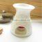 Flower logo carved ceramic aroma burner Porcelain fragrance burner for spa promotion                        
                                                Quality Choice