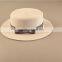 lady's elegant white boater hat paper with ribbon and bowknot