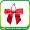 Red satin ribbon bow with elastic loop