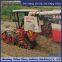 Modification of wheat harvester with triangular track wheels to prevent slipping on muddy ground