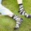 cheap young man fashion camo design non slip dots socks