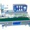 Continuous bag sealing machine with ink ribbon