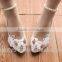 The little white bridesmaid shoes with a low heel and a high heel for the bride's shoes WS028