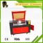 wood cnc laser cutting machine/wedding card design QL-1410 for sale in dubai