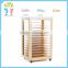 Factory sale manufacturer moblie wooden storage display rack for paper