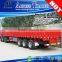 Tri-axis 40ft flat bed cargo transporting side breast board trailer truck with container locks