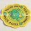 Professionally supply woven over locked fabric tag with light yellow base for patterned blouse