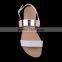 Party wear fancy stylish flat buckled up sandals for girls with shiny upper material