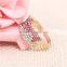 Zinc alloy pink white rhinestone full jewelled latest molded rose gold finger ring