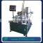 Rotary plastic cup sealing and filling machine