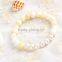 Wholesale Auspicious Buddhism style hand chain alloy horse with white pearl jewelry bead Giant clam bracelet