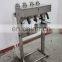 Perfume Filling Machine Penumatic Liquid Filling Machine Vacuum Liquid Filler Four Head