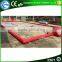 Hot New design red inflatable football field soap soccer field for sale